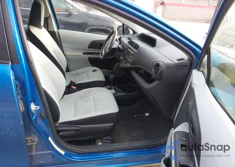 2014 Toyota Prius C One from USA, damaged, VIN JTDKDTB38E1566530